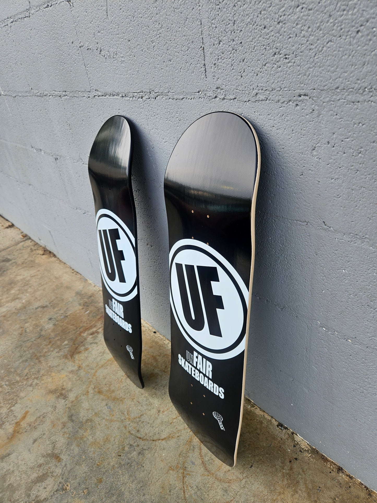 Black unFAIR Circle Logo Deck